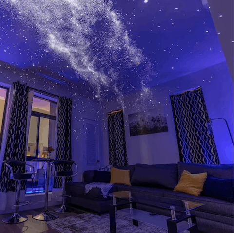 Switch on the galaxy projector and relax in the living space