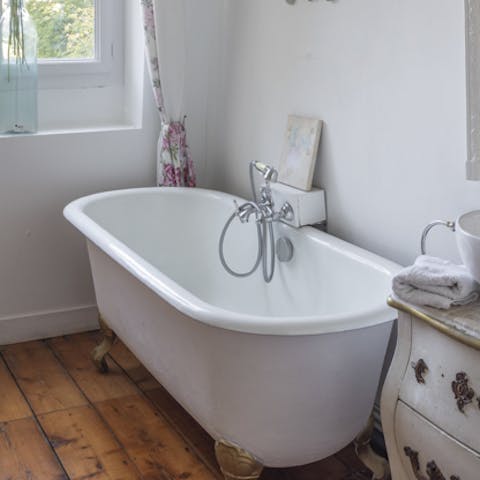 Enjoy a soak in one of the home's baths