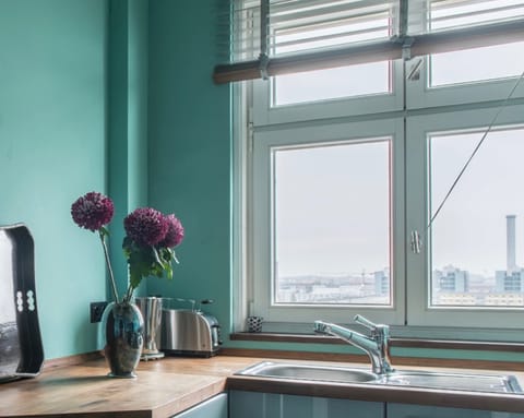 A turquoise blue kitchen