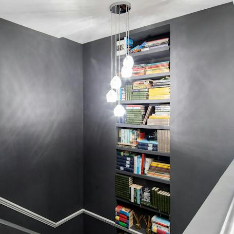 stunning stairwell bookshelf