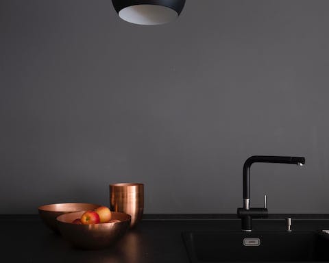 A sleek black kitchen