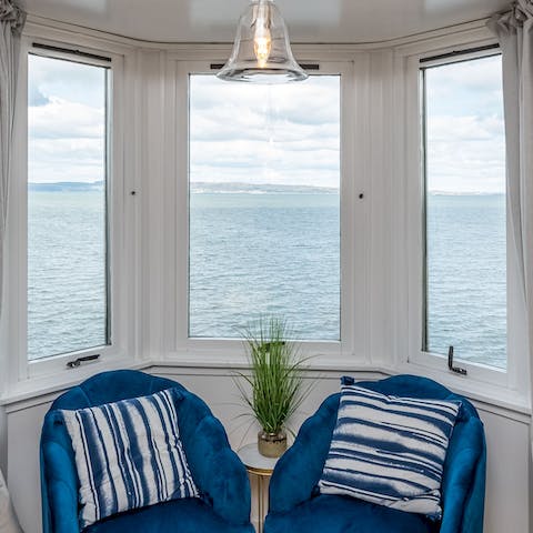 Soak up the sunsets and toast the day from this cosy perch