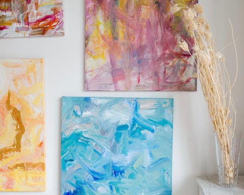 Take in the host's colourful abstract artworks and creations