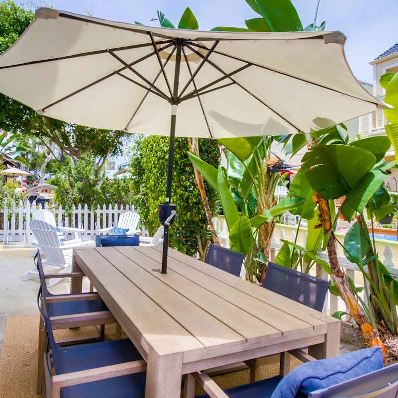 Dine under the shade of a parasol on the lower terrace