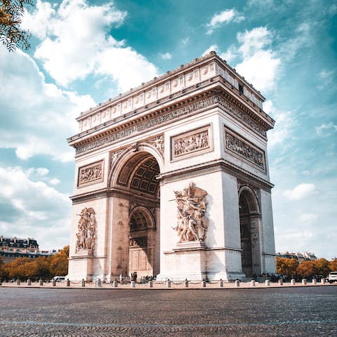 Pay a visit to the Arc de Triomphe, a short walk from your door