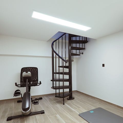 Work up a sweat with a workout in your private fitness room