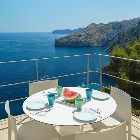 Dine alfresco with  breakfast on the balcony