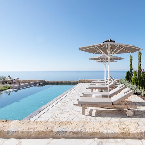 Spend lazy days lounging by the pool and taking in the jaw-dropping vistas
