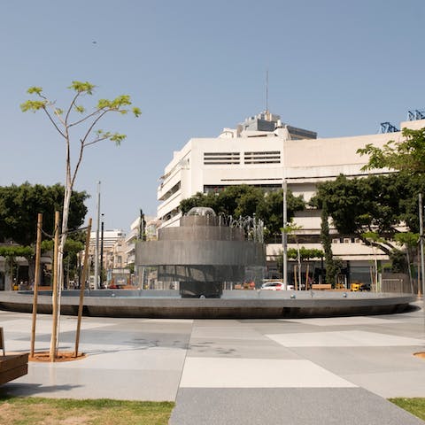 Walk for ten minutes to reach the city's iconic Dizengoff Square