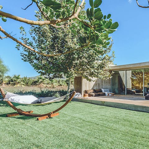 Doze in a hammock and feel the Ibizan sun warm your skin