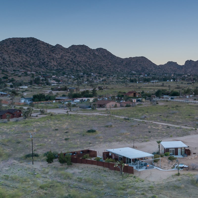 Admire the mountain views from this desert oasis