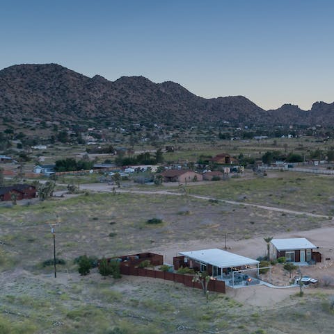 Admire the mountain views from this desert oasis