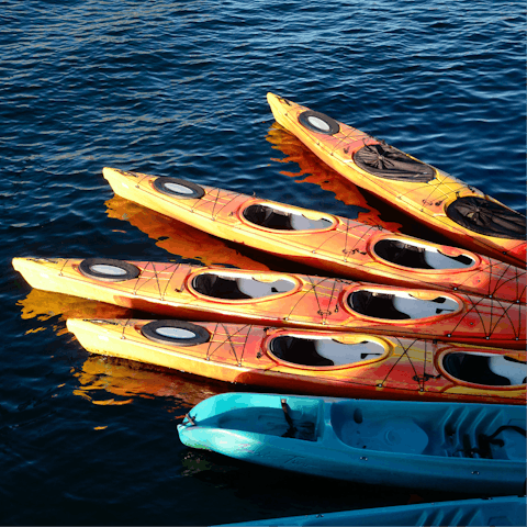 Rent kayaks or paddleboards on the lake