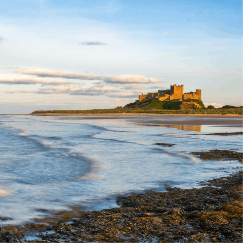 Take the refreshing walk along the shoreline to historic Bamburgh