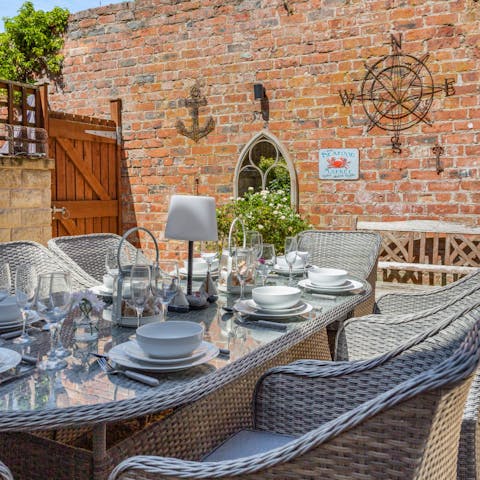 Light the barbecue and savour the fresh sea air from the courtyard