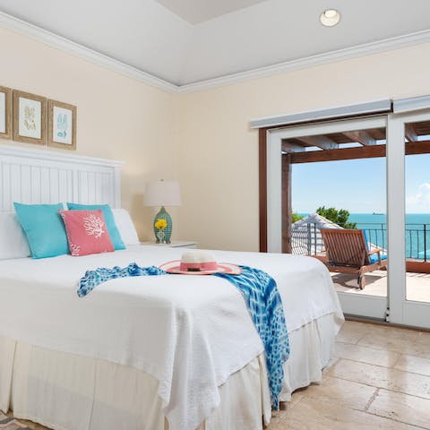 Wake up each morning to views of the vibrant blue sea from the bedroom window or balcony