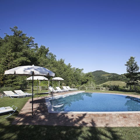 Relax by the private pool, surrounded by picturesque Tuscan countryside
