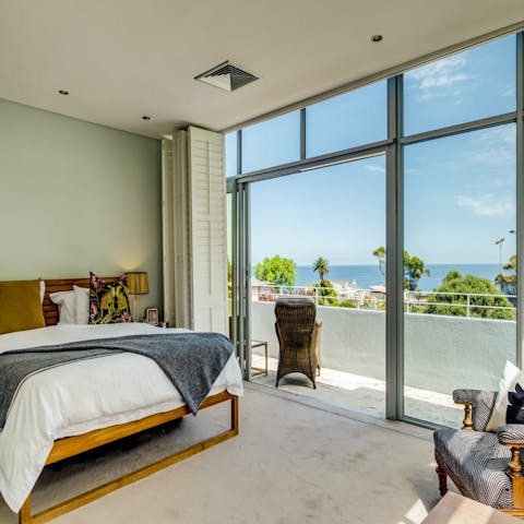 Wake up to ocean views from the bedroom's balcony