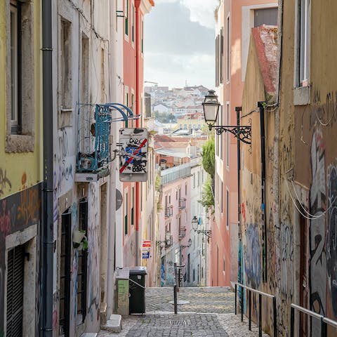 Explore vibrant Bairro Alto, known for its lively nightlife and bohemian atmosphere