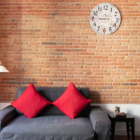 The exposed brick accent wall
