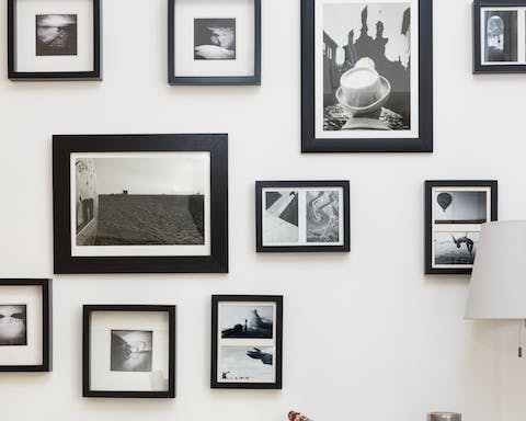 Enjoy the home's beautifully curated collection of art