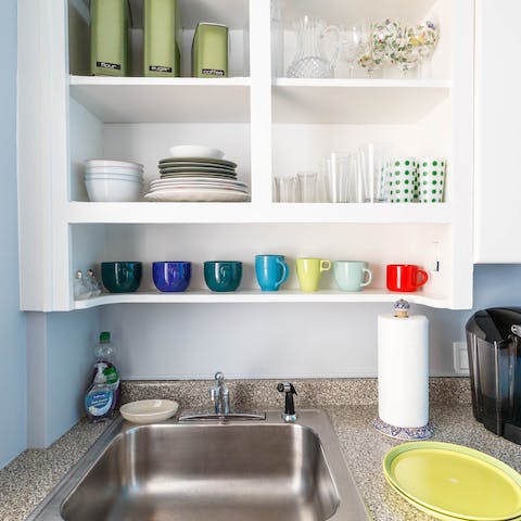 The fully equipped and brightly coloured kitchen