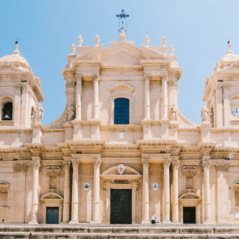 Drive into Noto and visit the picturesque cathedral