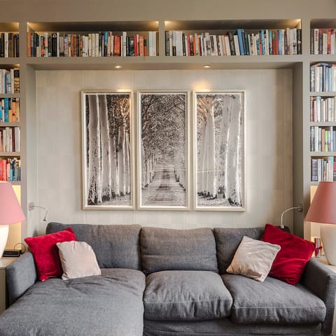 Pick a book from the curated collection and relax in the reading nook