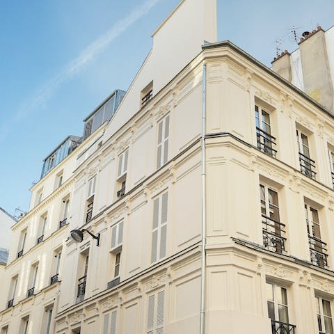 Stay in a typical Parisian building brimming with traditional character