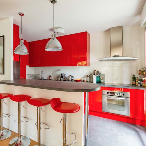 Bright red kitchen with a retro vibe