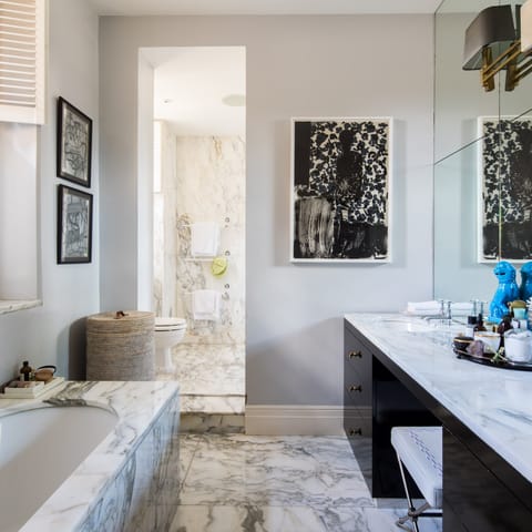 The marble-clad bathrooms