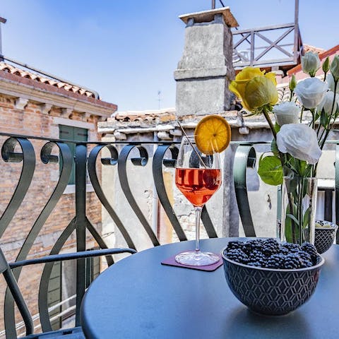Serve up your favourite Italian cocktail and enjoy it on the balcony