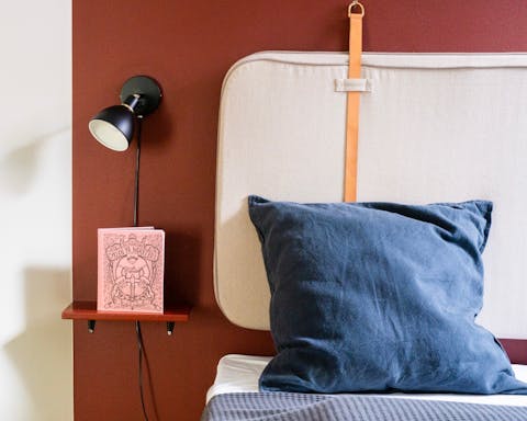 Get a good night's sleep in the cosy bedrooms, all with bold paint and stylish headboards