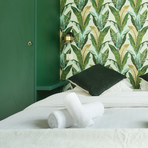 Drift off to dreamland in the tropical-inspired bedrooms