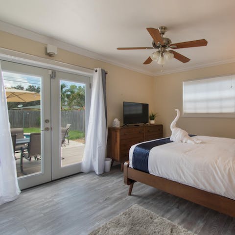 Wake up and step straight out onto the back garden and its refreshing pool