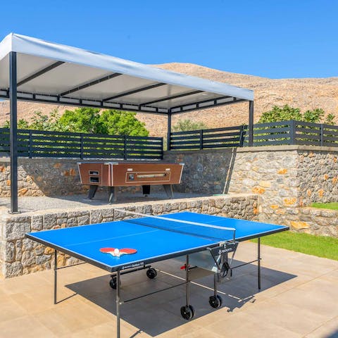 Play a few games of ping pong or a tournament of pool