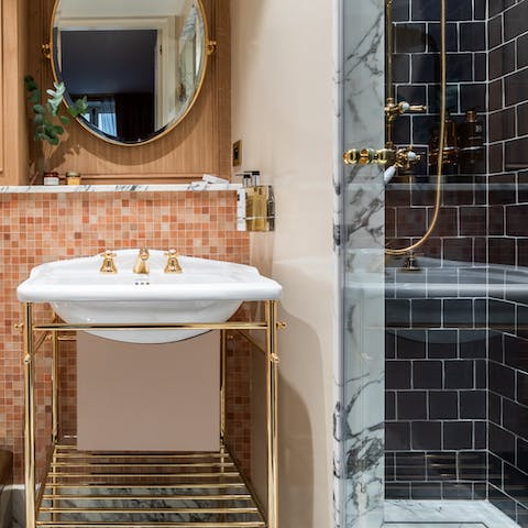 Get dolled up in the apartment's sophisticated hotel bathroom