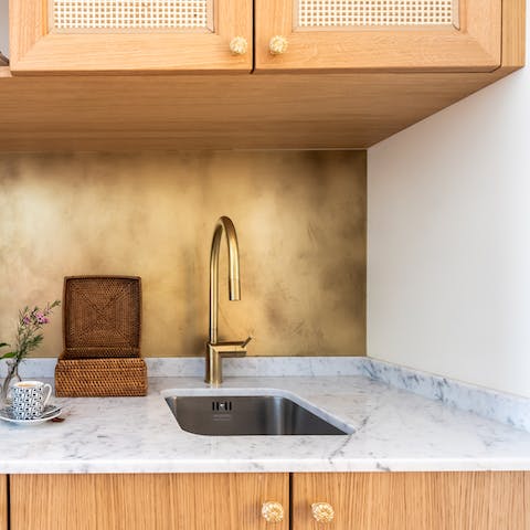 Prepare light bites and snacks in the compact kitchenette, in between sumptuous meals out