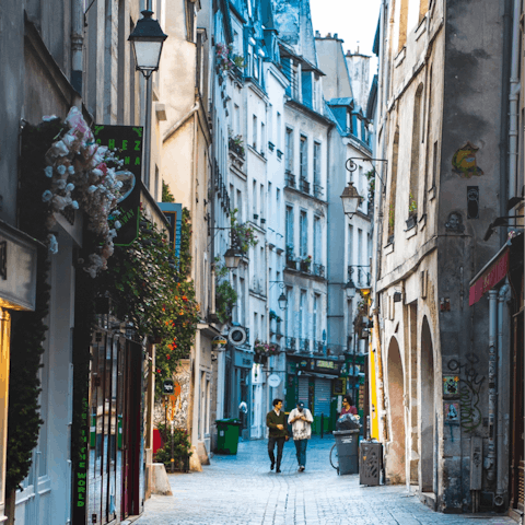 Wander into Le Marais for its selection of cosy restaurants