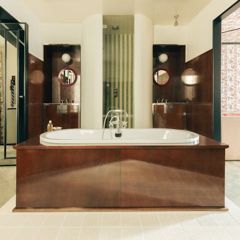 Unwind in style with a soak in the freestanding bathtub