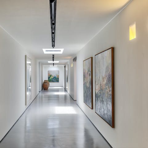 Admire the paintings in the art gallery-style space