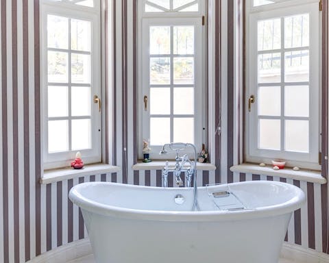 Enjoy opulent ensuites with claw-foot baths and Japanese soaking tubs