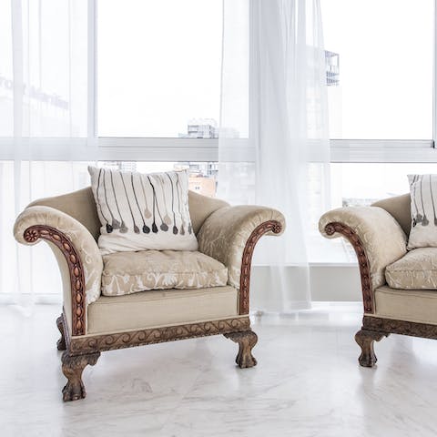 This baroque-inspired chair duo