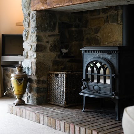 Get cosy by the log burner on chilly evenings