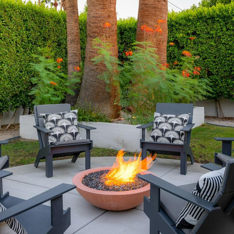 Pour a glass of your favourite drink and gather around the fire pit