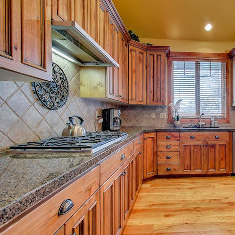 Prepare an elaborate dinner using the massive kitchen space