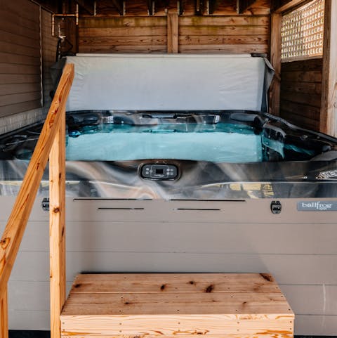 Relax in the hot tub after a day packed with outdoor activities