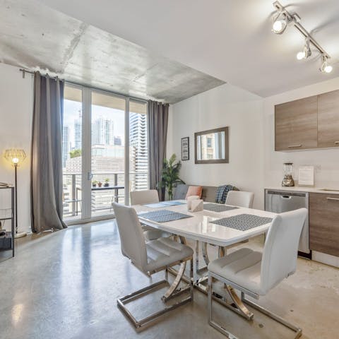 Prepare a homecooked meal in the sleek contemporary kitchen to enjoy together in the dining area