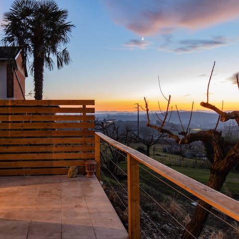Watch the sunset over the stunning countryside from the private terrace 