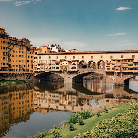 Stroll across medieval Ponte Vecchio, a one-minute walk away